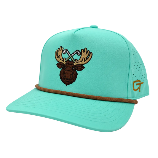 A mint green baseball cap with a brown embroidered moose head and crossed golf clubs on the front, a brown rope detail across the visor, and a gold embroidered 'CT' logo on the side.